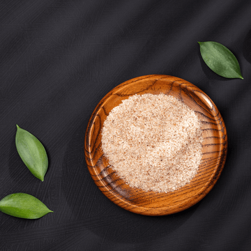 A close-up view of psyllium husk powder, symbolizing the comprehensive guide to its health benefits, dosage, and side effects.